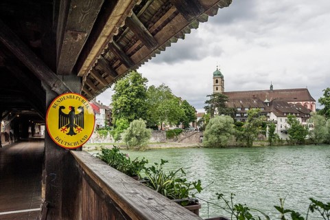 Border sign on the longest covered wooden bridge in Europe
