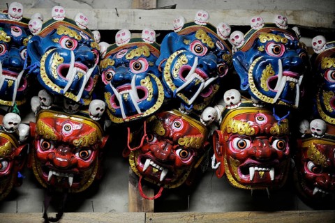 Traditional religious masks in a chamber of Mongar Dzong fortress