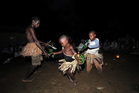 Pygmies of the Bakola people celebrating with song and dance