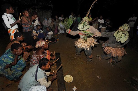 Pygmies of the Bakola people celebrating with song and dance