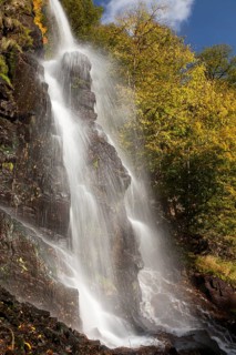 Waterfall in an autumnal landscape in Trusetal