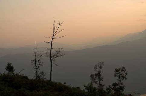 Sunset over Annapurna range in clouds