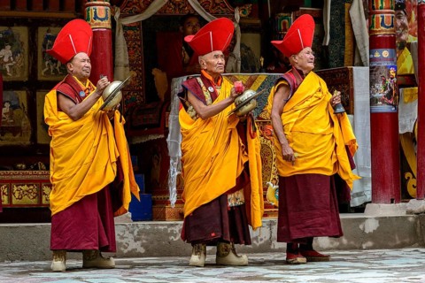 Monks making music as part of the opening ceremony of the Hemis Festival