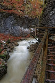 Wooden bridge and a waterfall in Baerenschuetzklamm gorge