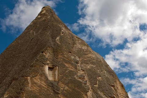 Entrance hole to a dovecote in a tuff cone