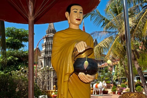 Statue of a mendicant monk at Wat Preah Prohm Rath temple