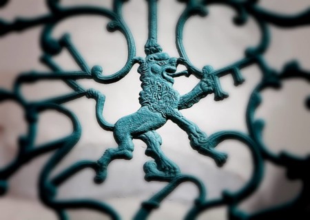 Nassau lion in metal railing