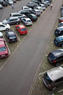Car park with many parked cars