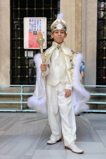 Turkish boy wearing traditional clothing during a circumcision ceremony