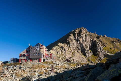 Rifugio Quintino Sella mountain hut below  Monte Viso or Monviso Mountain