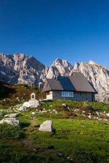 Rifugio Garelli mountain hut in front of the northern face of Punta Marguareis Mountain
