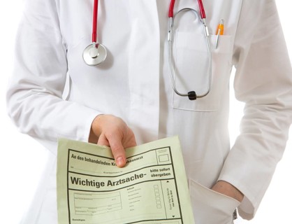 Female doctor holding a medical document of a consultation for the family doctor or attending physician of the patient