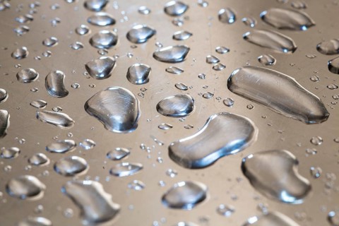 Water droplets on a metal surface