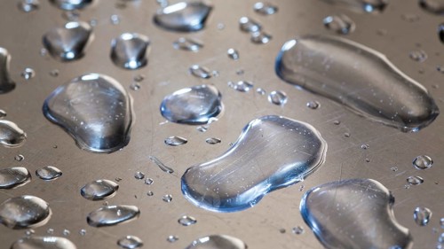Water droplets on a metal surface