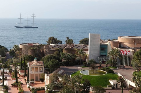 View from the balcony of the Monte Carlo Bay Hotel & Resort over the garden and  Jimmy'z Night Club towards the sea with the large yacht Maltese Falcon