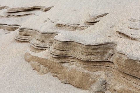 Sand dune with wind erosion