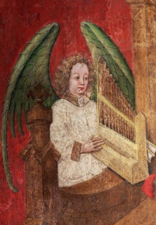 Angel playing an organ