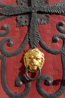 Historic door with fittings and a lion head door knocker
