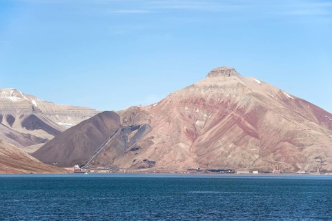 Abandoned Russian mining town of Pyramiden below the mountain of the same name