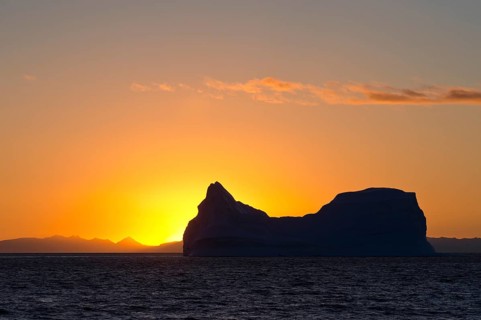 Iceberg at sunset