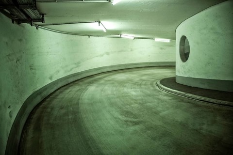 Narrow and dirty access to a multi-storey car park