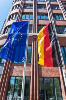 The European flag and the flag of Germany flying in front of the building of the Friedrich-Ebert-Stiftung