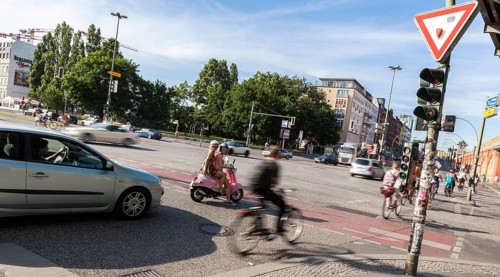 City traffic at the road junction of Warschauer Strasse and Stralauer Allee