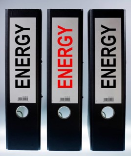 Three ring binders labeled Energy
