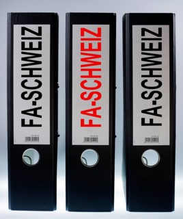 Three file folders labeled "FA-Schweiz"
