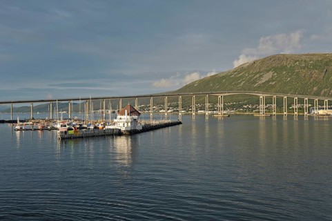 Tromsøsund with Tromsøbrua or Tromsø Bridge in evening light