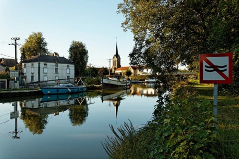 House boat in the harbour on the Canal des Vosges