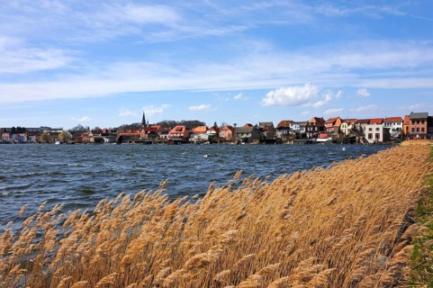 Townscape of the island town of Malchow and Malchow Lake