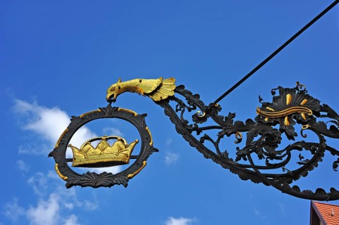 Hanging sign of the "Goldene Krone" guesthouse
