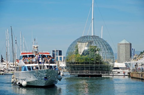 Excursion boat in front of the glass sphere "Biosfera"