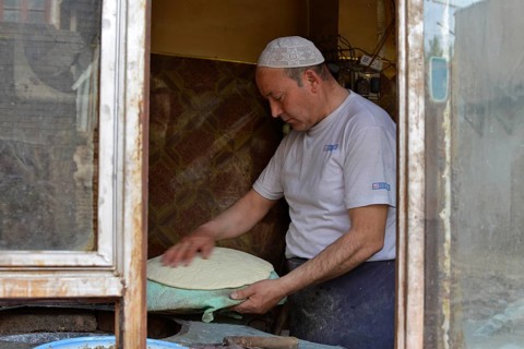 Flatbread baker in a bakery