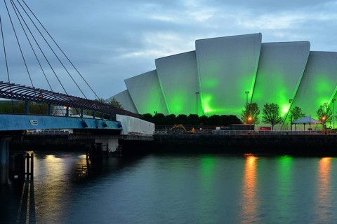 Illuminated Clyde Auditorium with the Bell Bridge on the River Clyde