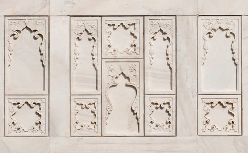 Marble slabs carved with blind arcading