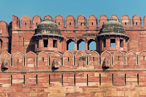 Fortified outer walls with battlements and loopholes