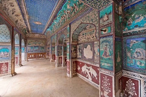 Wall paintings or frescoes painted with natural colours from the Bundikalam school of painting