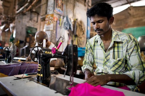Tailor in a former building of Meenakshi Amman Temple or Sri Meenakshi Sundareswarar Temple