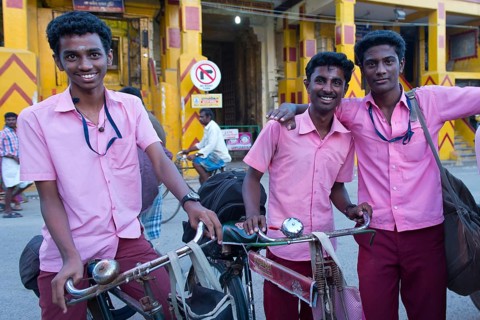 Students in school uniforms standing in front of the entrance to the Ramanathaswami Temple