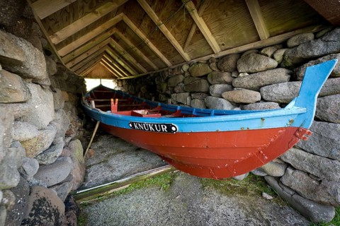 Traditional boat in a shed