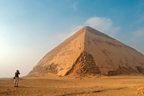 Tourist takes pictures of Sneferu's Bent Pyramid