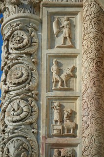 Medieval sculptural reliefs on the door of the Baptistry of St. John