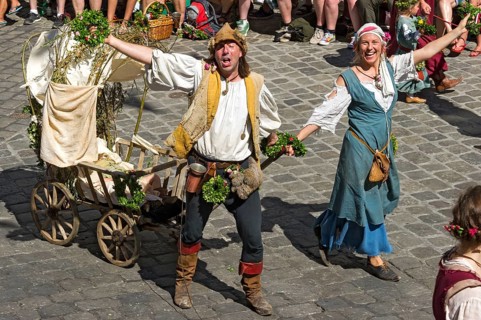 Impoverished couple pulling a baby carriage