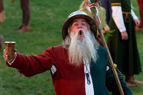 Bailiff holding a cup wearing a medieval costume at the showgrounds