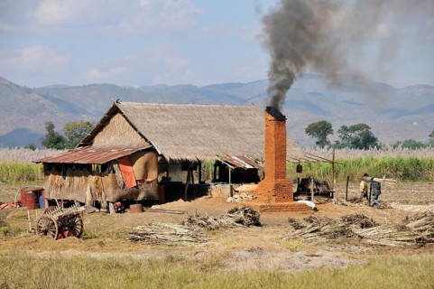 Small sugar mill in the countryside processing sugar cane