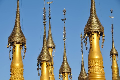 Gold-coloured stupas with golden hti