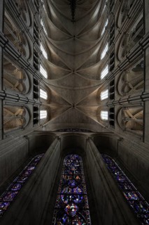 Vaulted ceiling and stained-glass windows