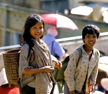 Girl and boy of the Cham or Tscham people